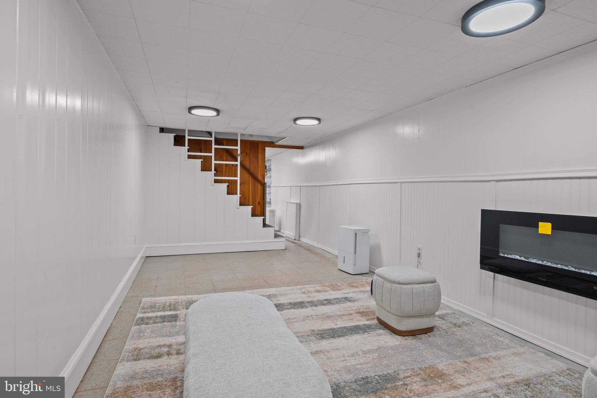 1434 Holcomb Road Huntingdon Valley, PA 19006 - Photo 41 of 49 a view of an empty room and wooden floor