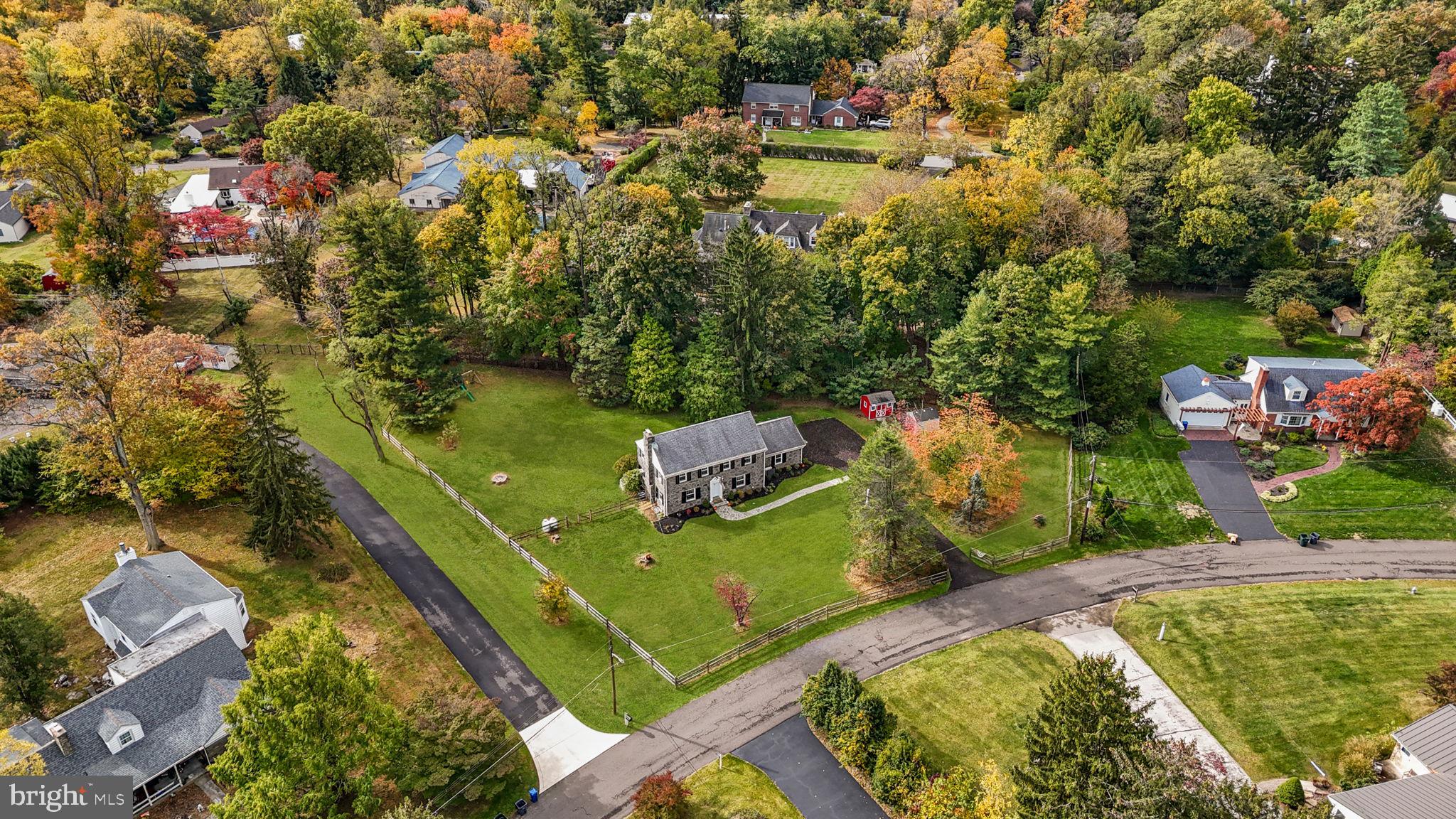 1434 Holcomb Road Huntingdon Valley, PA 19006 - Photo 5 of 49 an aerial view of a house with a yard lake lake and outdoor seating