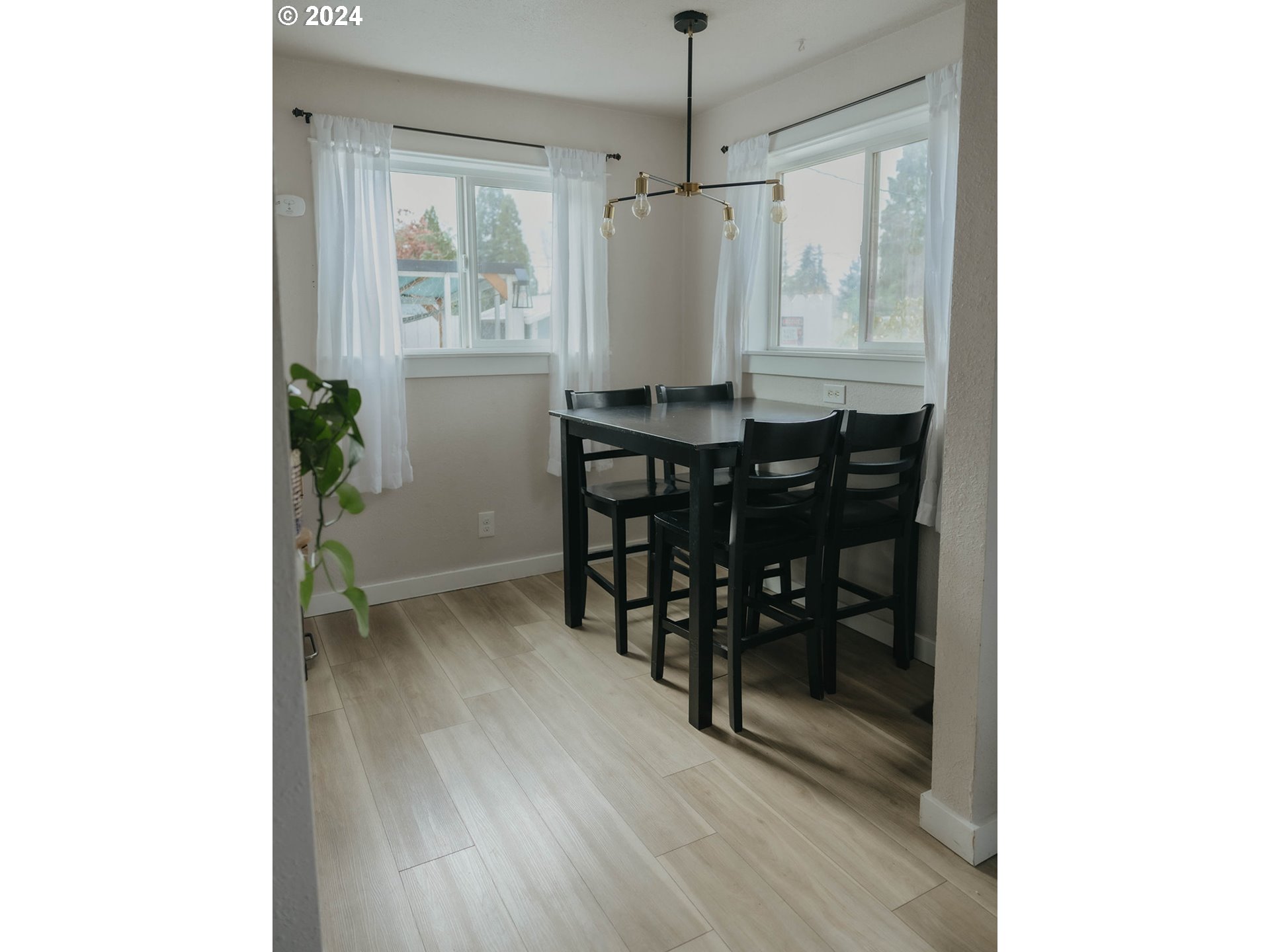 363 57th Street Springfield, OR 97478 - Photo 14 of 19 a dining room with furniture and window