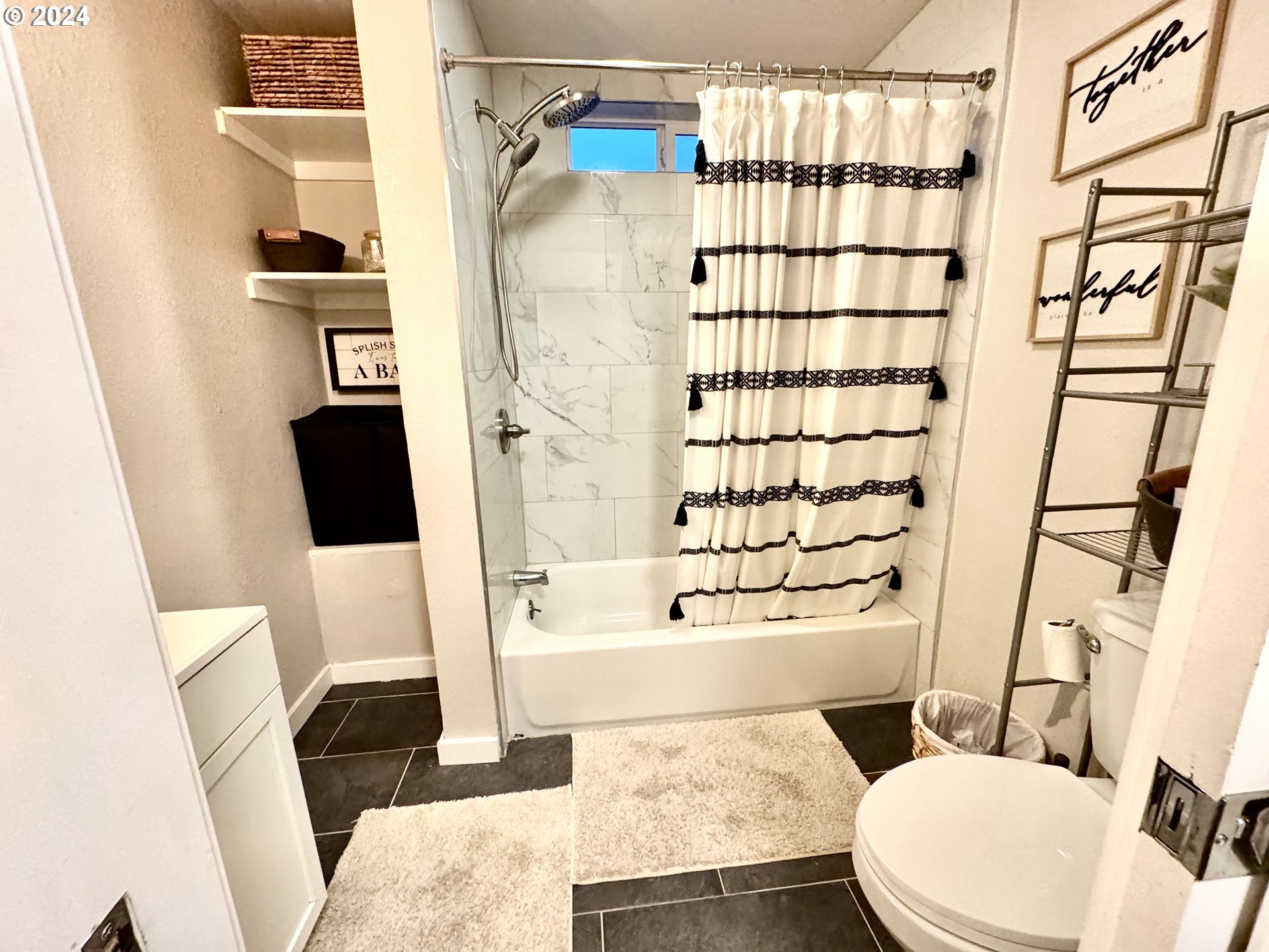 363 57th Street Springfield, OR 97478 - Photo 6 of 19 a bathroom with a sink toilet and shower