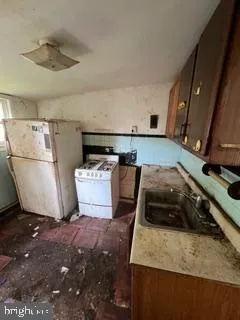 a room with a couch and a stove