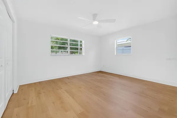 an empty room with a empty space and window