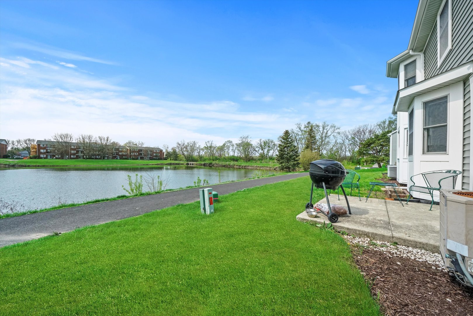709 Daybreak Lane Carol Stream, IL 60188 - Photo 20 of 30 a view of a garden with a slide
