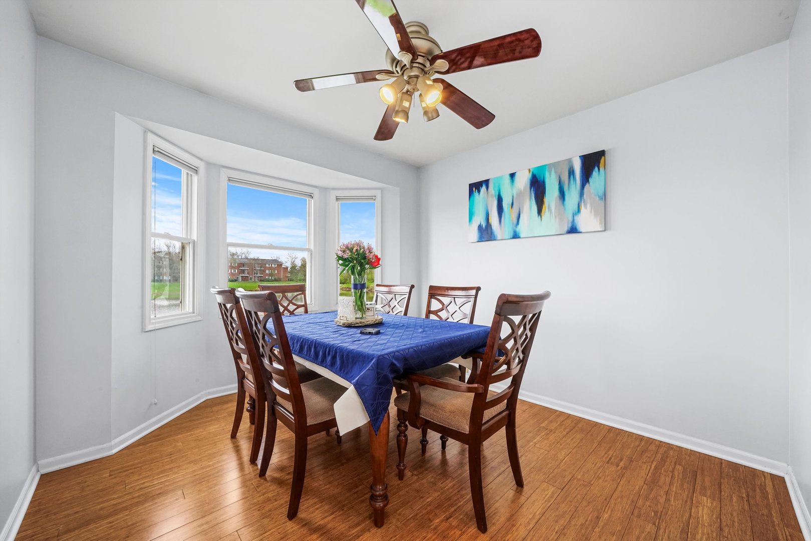 709 Daybreak Lane Carol Stream, IL 60188 - Photo 4 of 30 a view of a dining room with furniture and a window