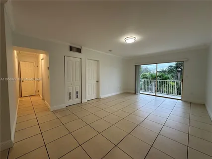 a view of a livingroom with a large window