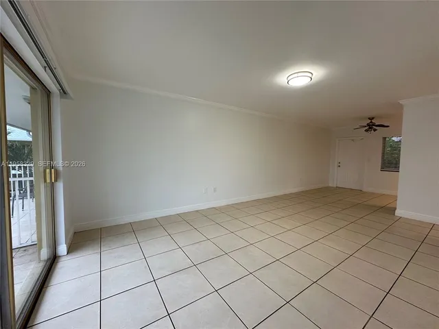 a view of an empty room and window