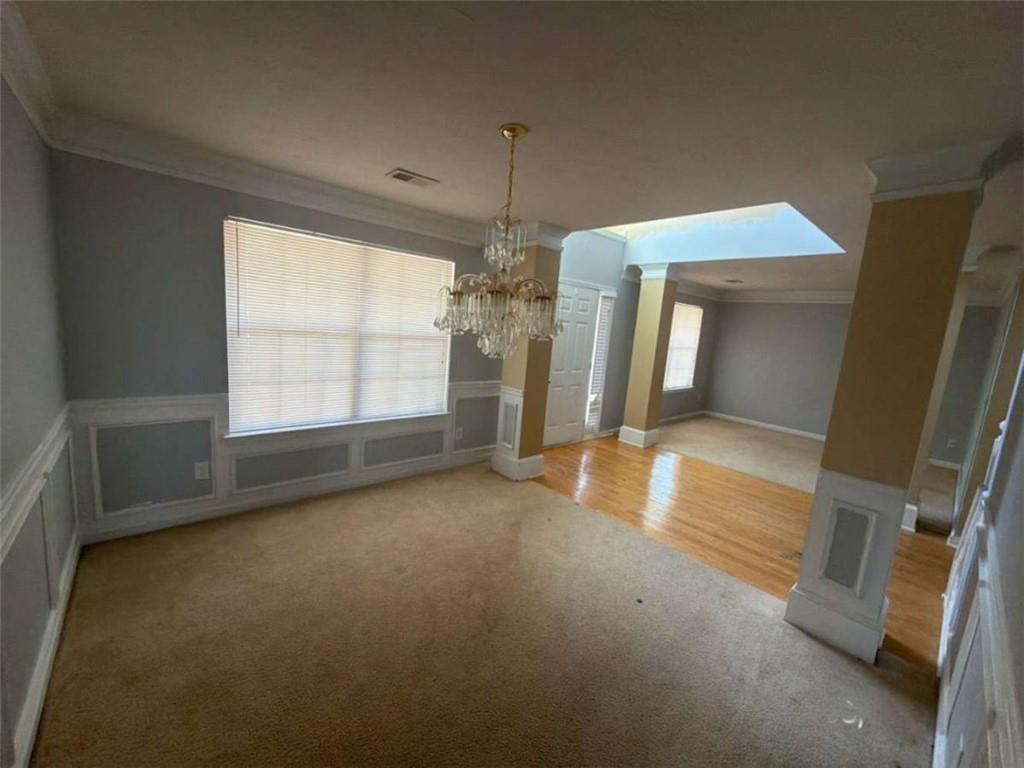135 Timberlake Terrace Covington, GA 30016 - Photo 2 of 6 a view of empty room with windows