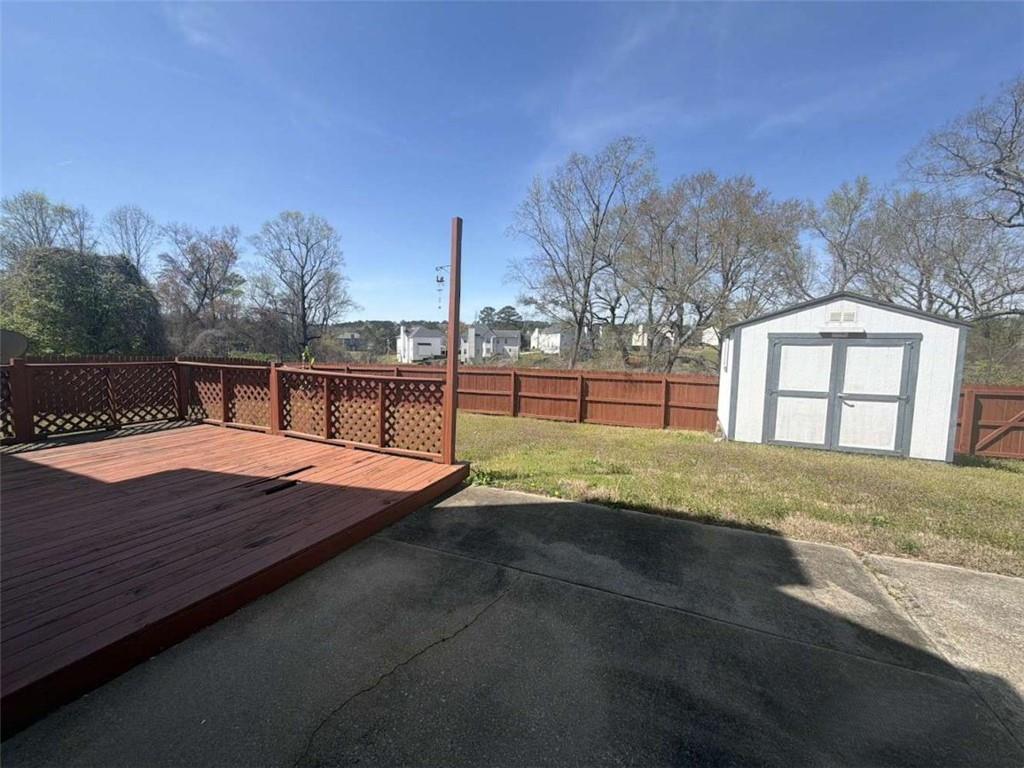135 Timberlake Terrace Covington, GA 30016 - Photo 5 of 6 a view of outdoor space with trampoline