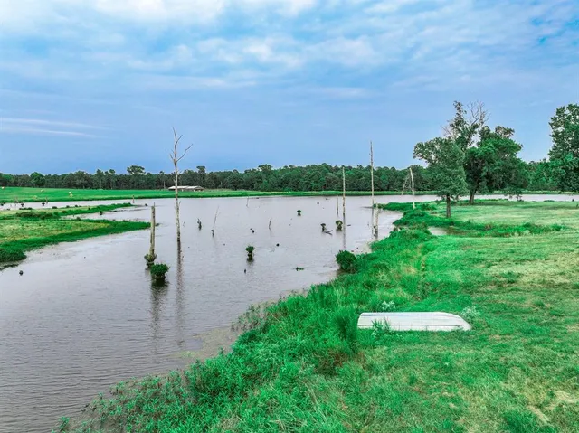 a view of a golf course with a lake