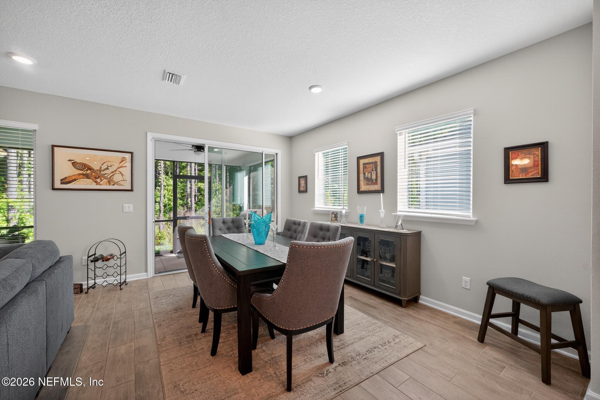 75505 Banyan Way Yulee, FL 32097 - Photo 15 of 30 a dining room with furniture and window