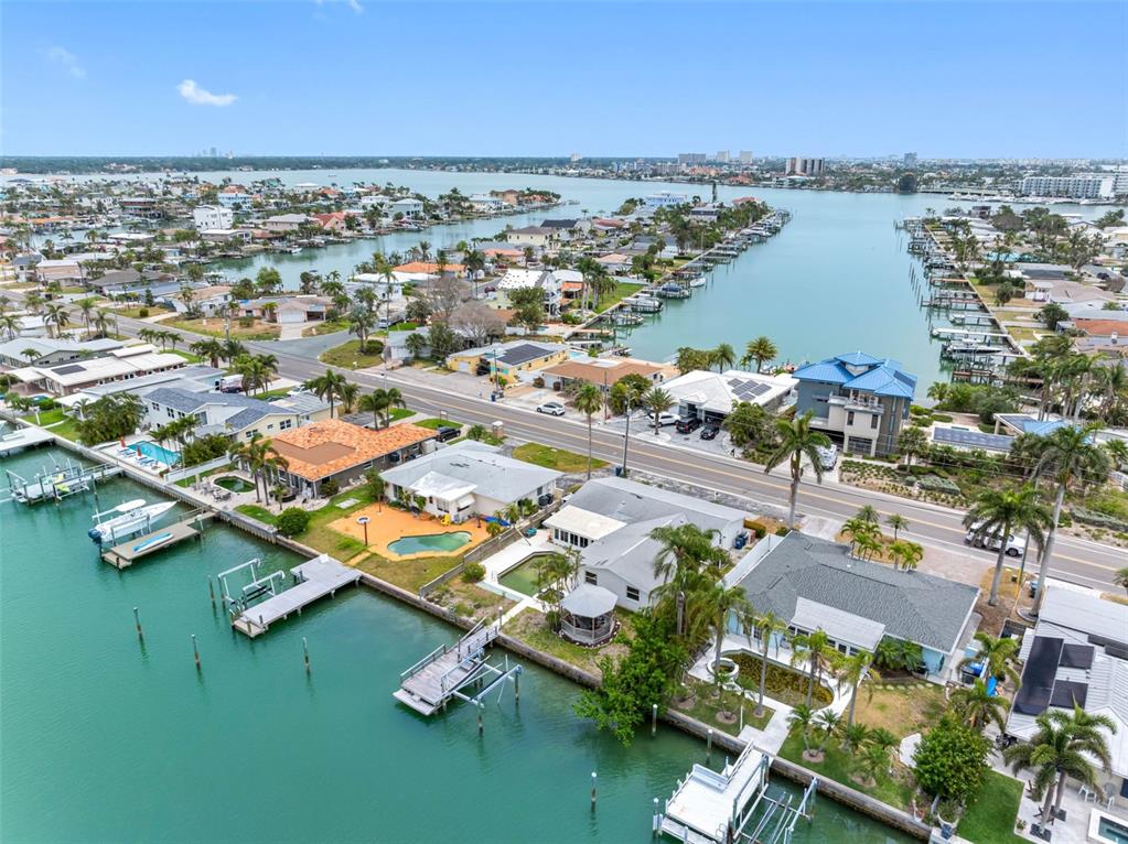 440 115th Avenue Treasure Island, FL 33706 - Photo 17 of 25 an aerial view of residential houses with outdoor space