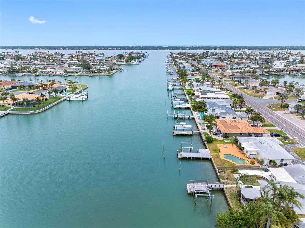440 115th Avenue Treasure Island, FL 33706 - Photo 18 of 25 an aerial view of ocean and residential houses with outdoor space
