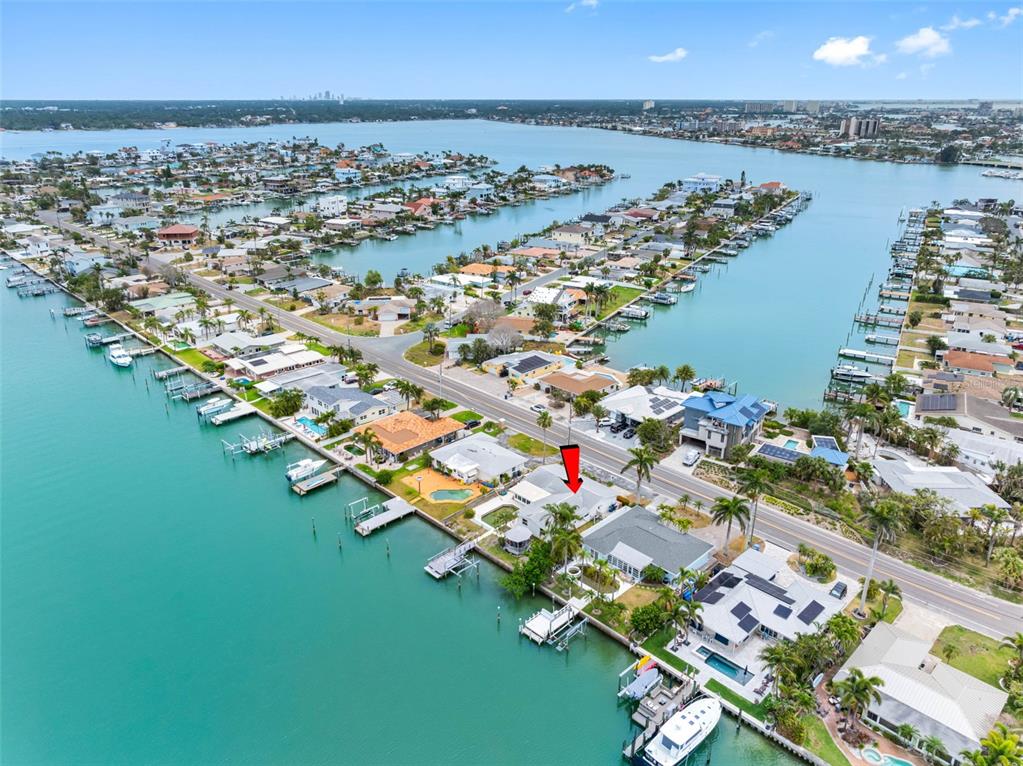 440 115th Avenue Treasure Island, FL 33706 - Photo 5 of 25 an aerial view of ocean and residential houses with outdoor space
