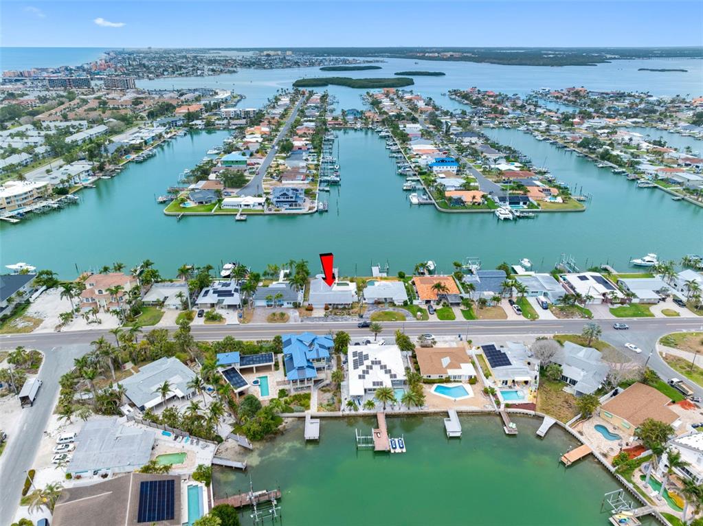 440 115th Avenue Treasure Island, FL 33706 - Photo 9 of 25 an aerial view of a house with outdoor space