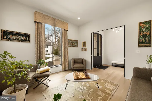 a stove top oven sitting inside of a kitchen
