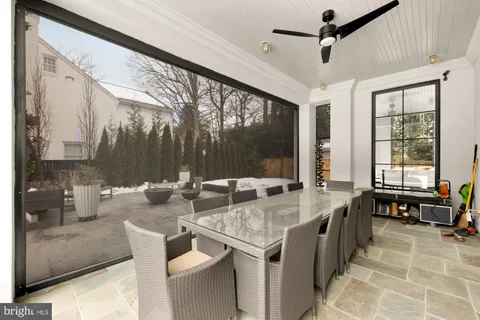 a bedroom with a large bed and a large window