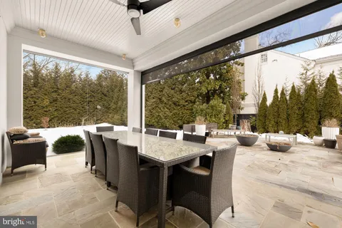 a bedroom with a bed and a table