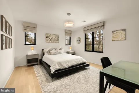 a view of living room with furniture and flat screen tv