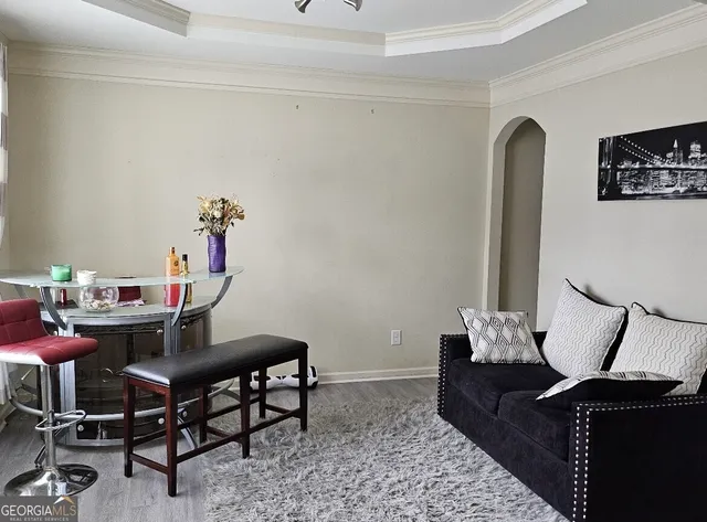 a view of a workspace with furniture