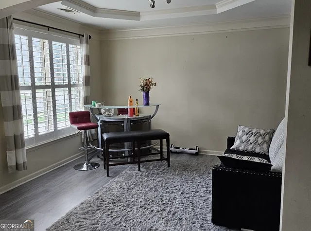 a workspace with furniture and a window