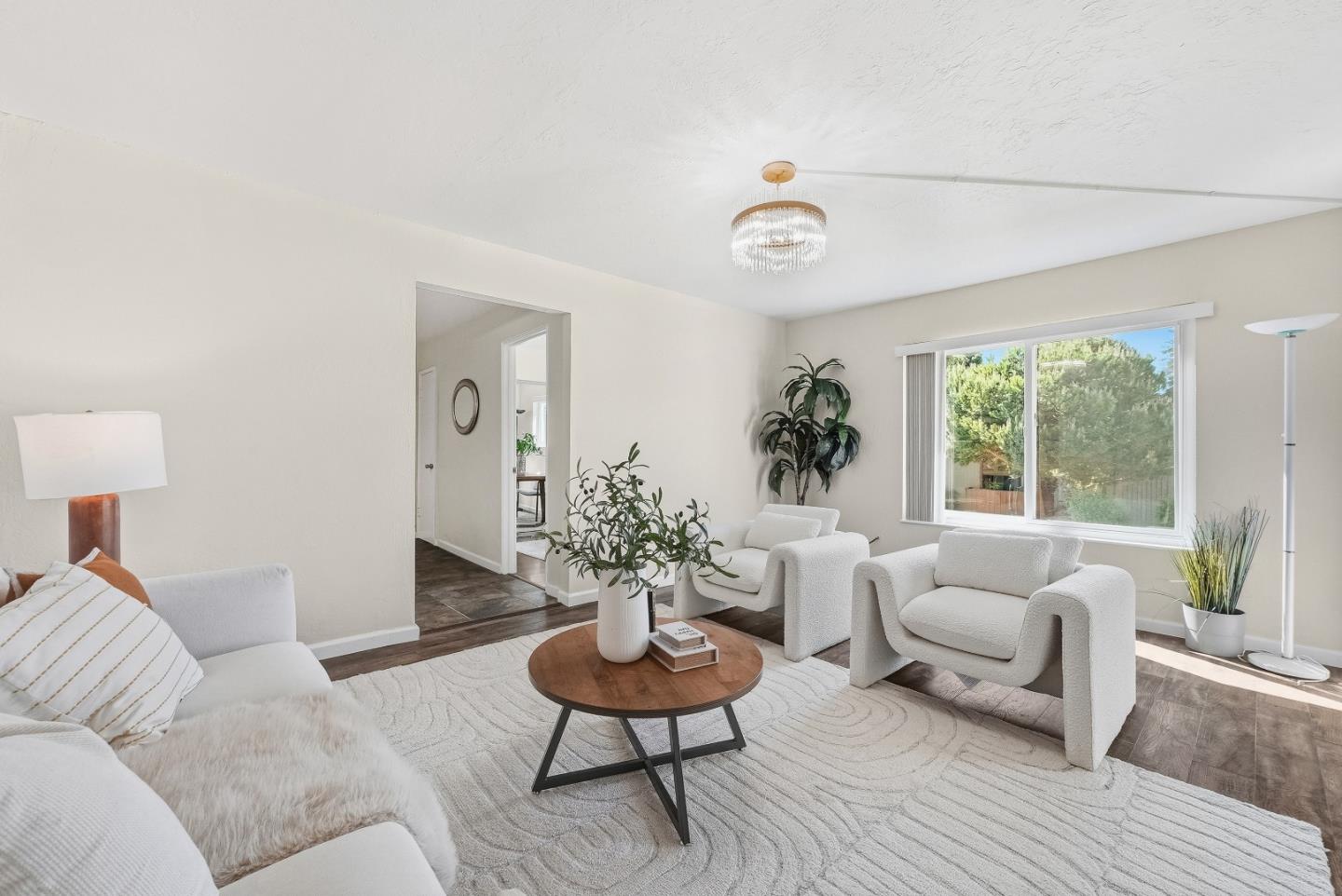 701 North Rengstorff Avenue, Unit 7 Mountain View, CA 94043 - Photo 6 of 32 a living room with furniture and a large window