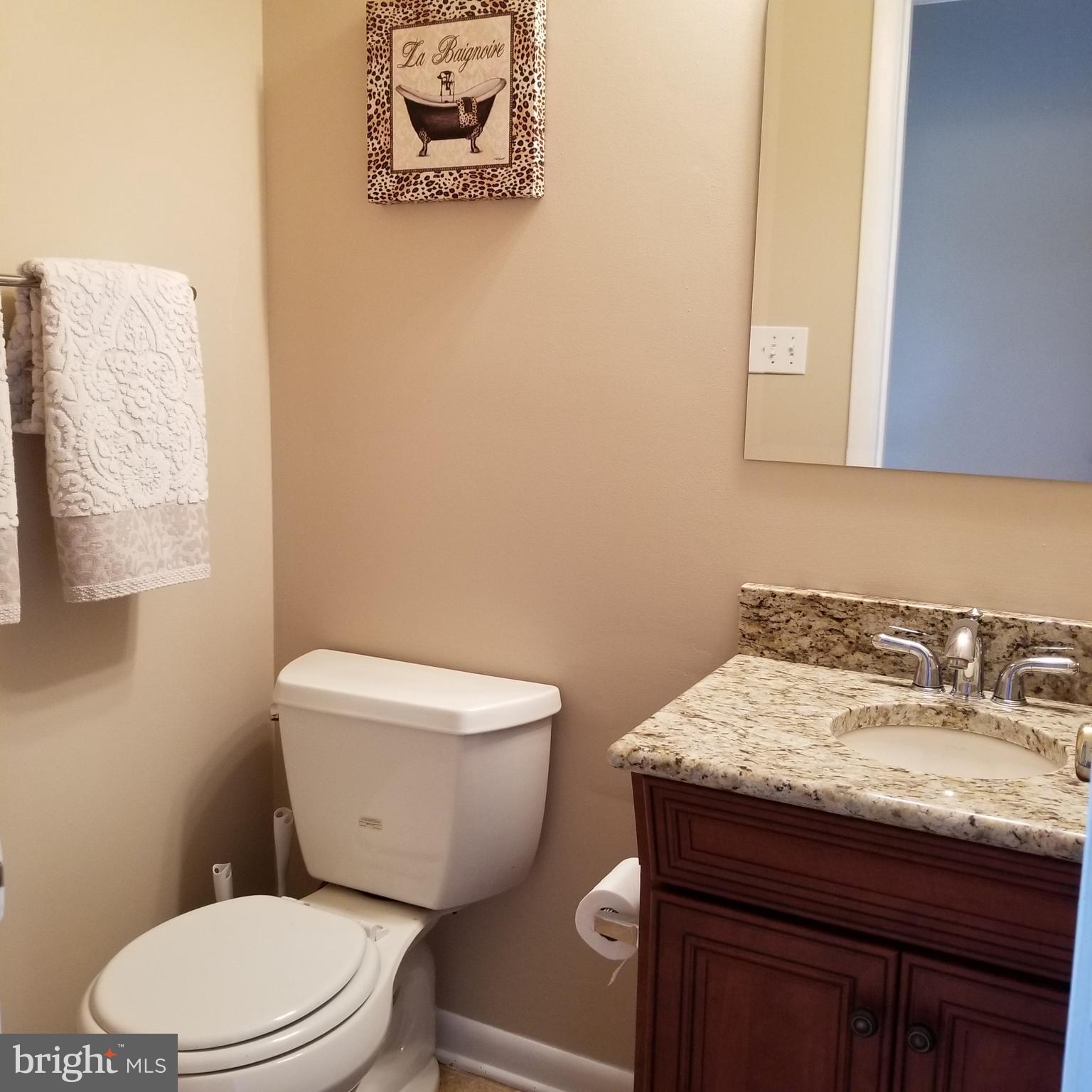 7903 Shore Road Baltimore, MD 21222 - Photo 19 of 41 Half bath on main level