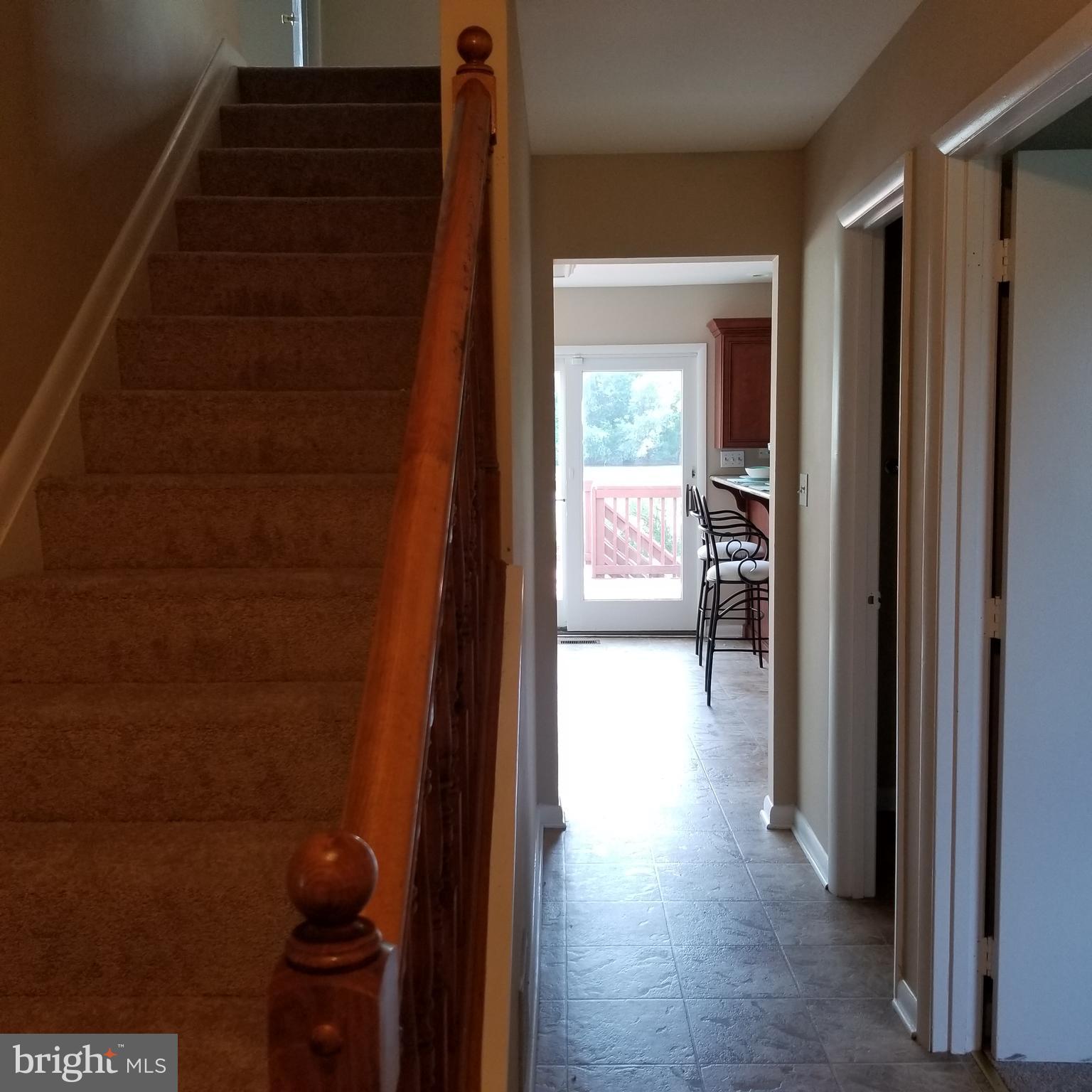 7903 Shore Road Baltimore, MD 21222 - Photo 22 of 41 Entry foyer and hall with stairway to 2nd level.