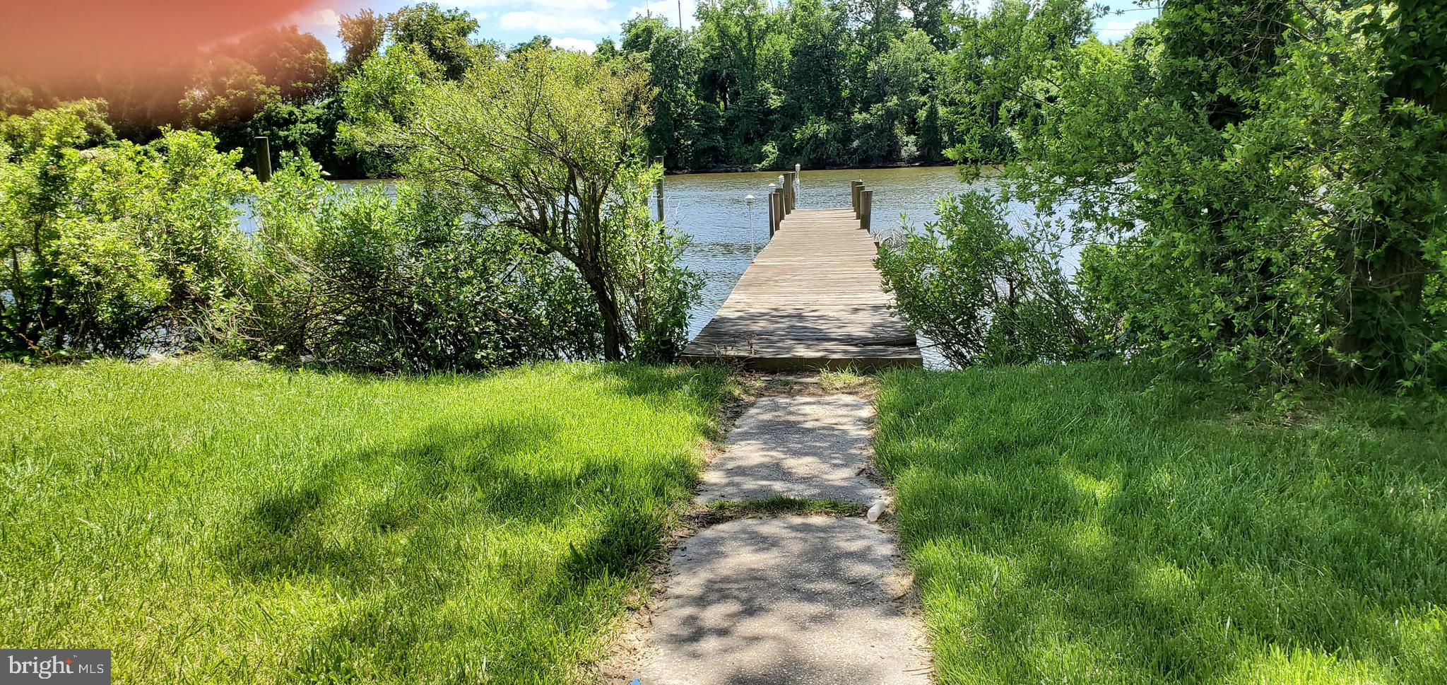7903 Shore Road Baltimore, MD 21222 - Photo 4 of 41 The pier leads to Lynch Cove from Bear Creek
