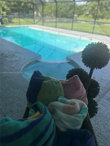 a view of a living room and hardwood floor