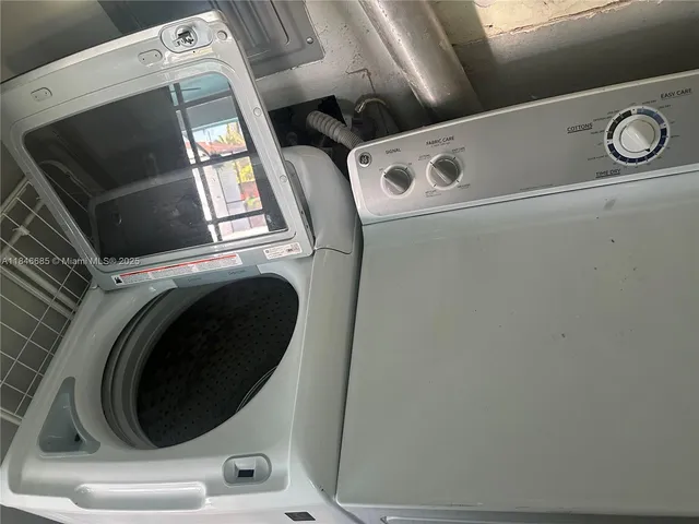 a view of an house with backyard space and garden