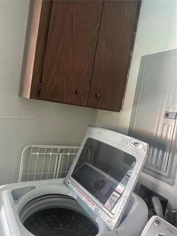 a view of lake with building in background