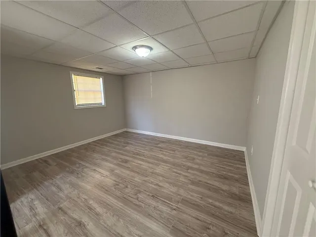 a view of a chairs on the roof deck