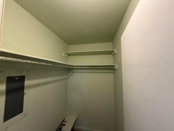 a bathroom with a shower and a tub