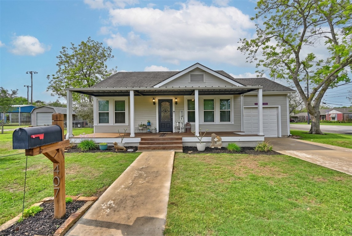 407 North Summit Street Weimar, TX 78962 - Photo 24 of 24 a view of a house with a yard patio and swimming pool