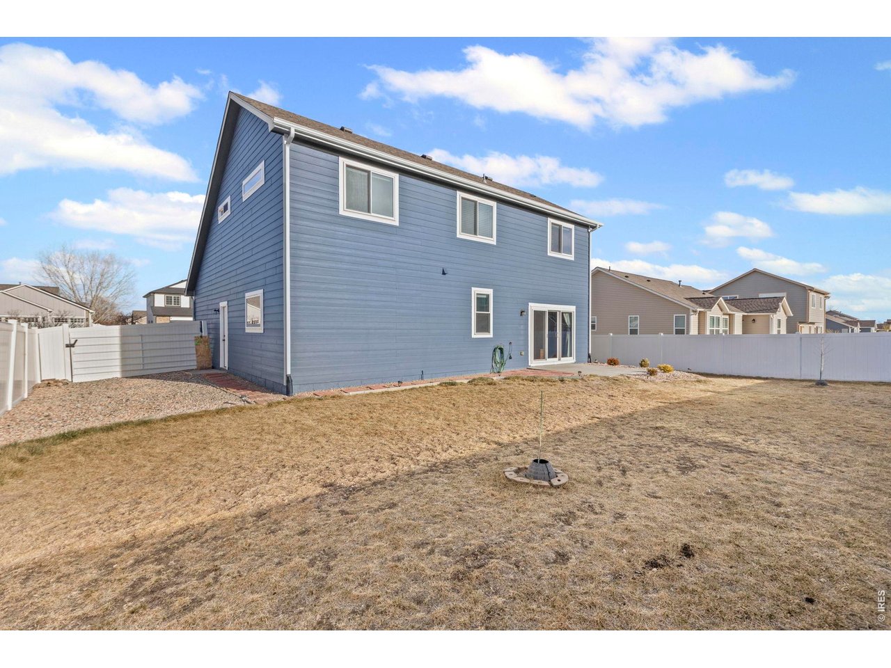 6963 Lee Street Wellington, CO 80549 - Photo 18 of 24 Fully fenced backyard with plenty of space to customize-ideal for outdoor living, pets, or play.