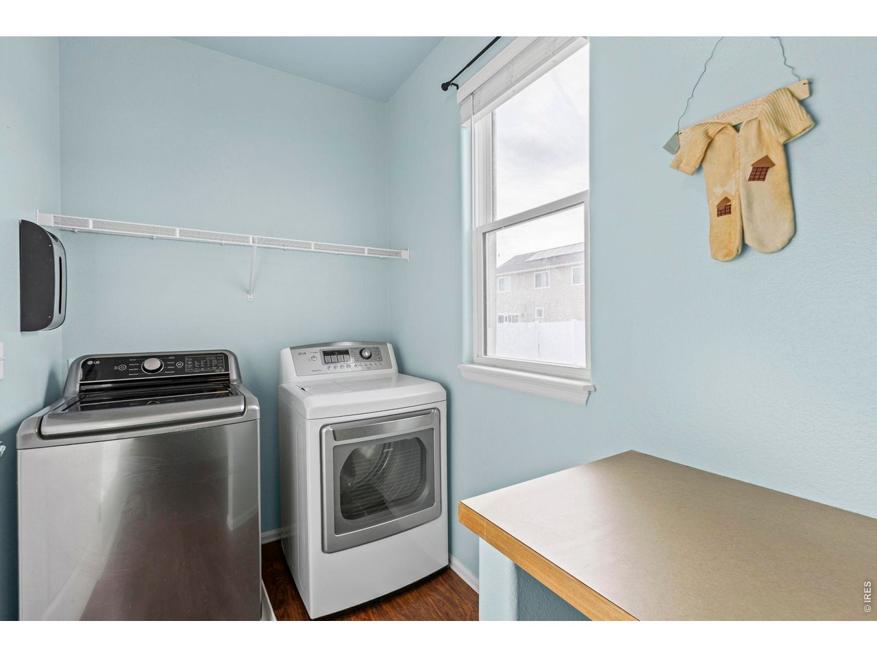 6963 Lee Street Wellington, CO 80549 - Photo 10 of 24 Laundry Room on upper floor with bedrooms for convenience.