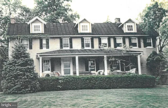 front view of house with a yard
