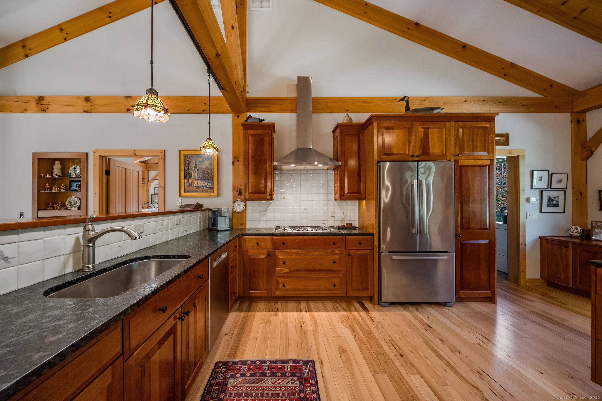 435 Hamburg Road Lyme, CT 06371 - Photo 13 of 40 a kitchen with stainless steel appliances granite countertop a refrigerator and a sink