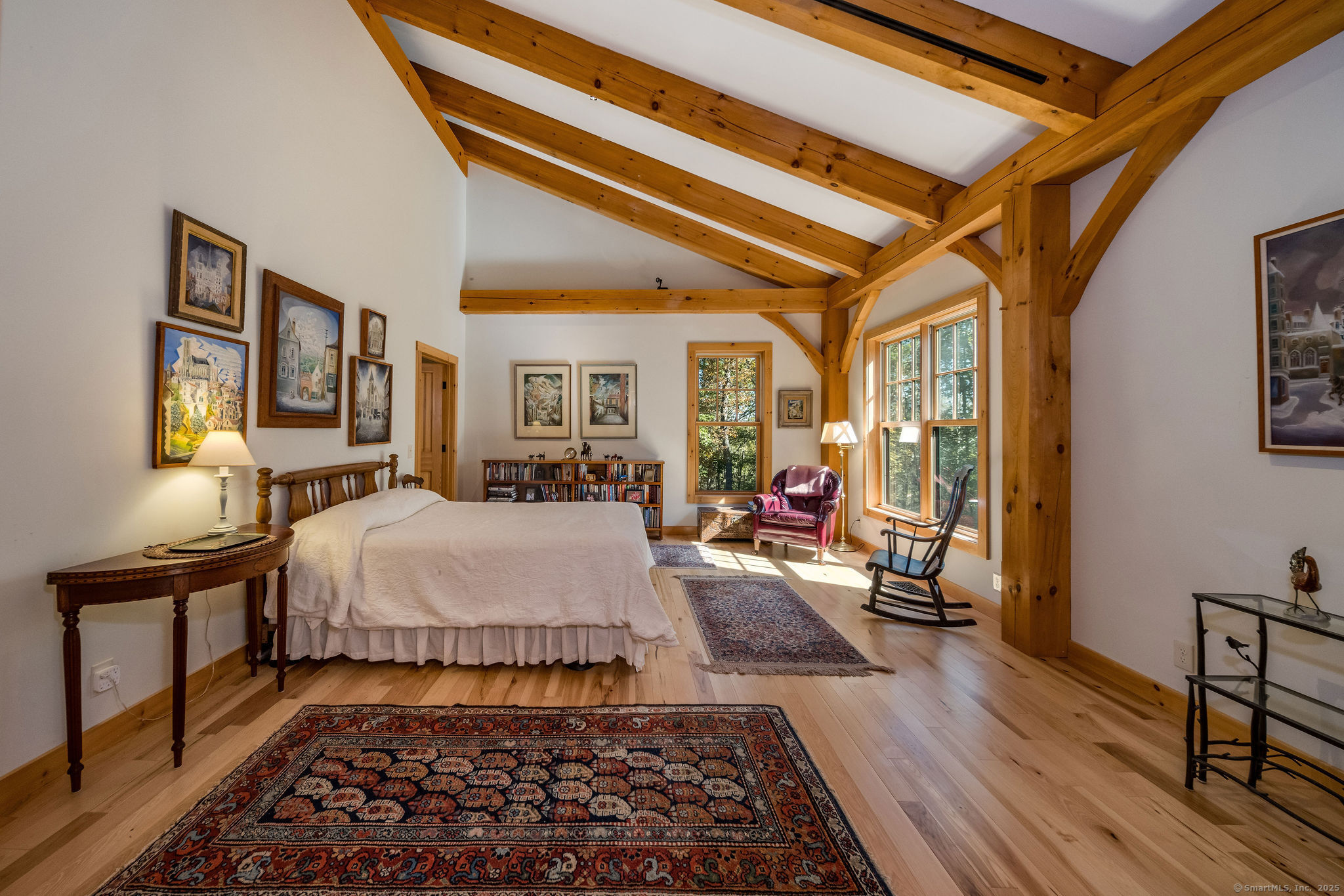 435 Hamburg Road Lyme, CT 06371 - Photo 22 of 40 a bed room with a bed and wooden floor