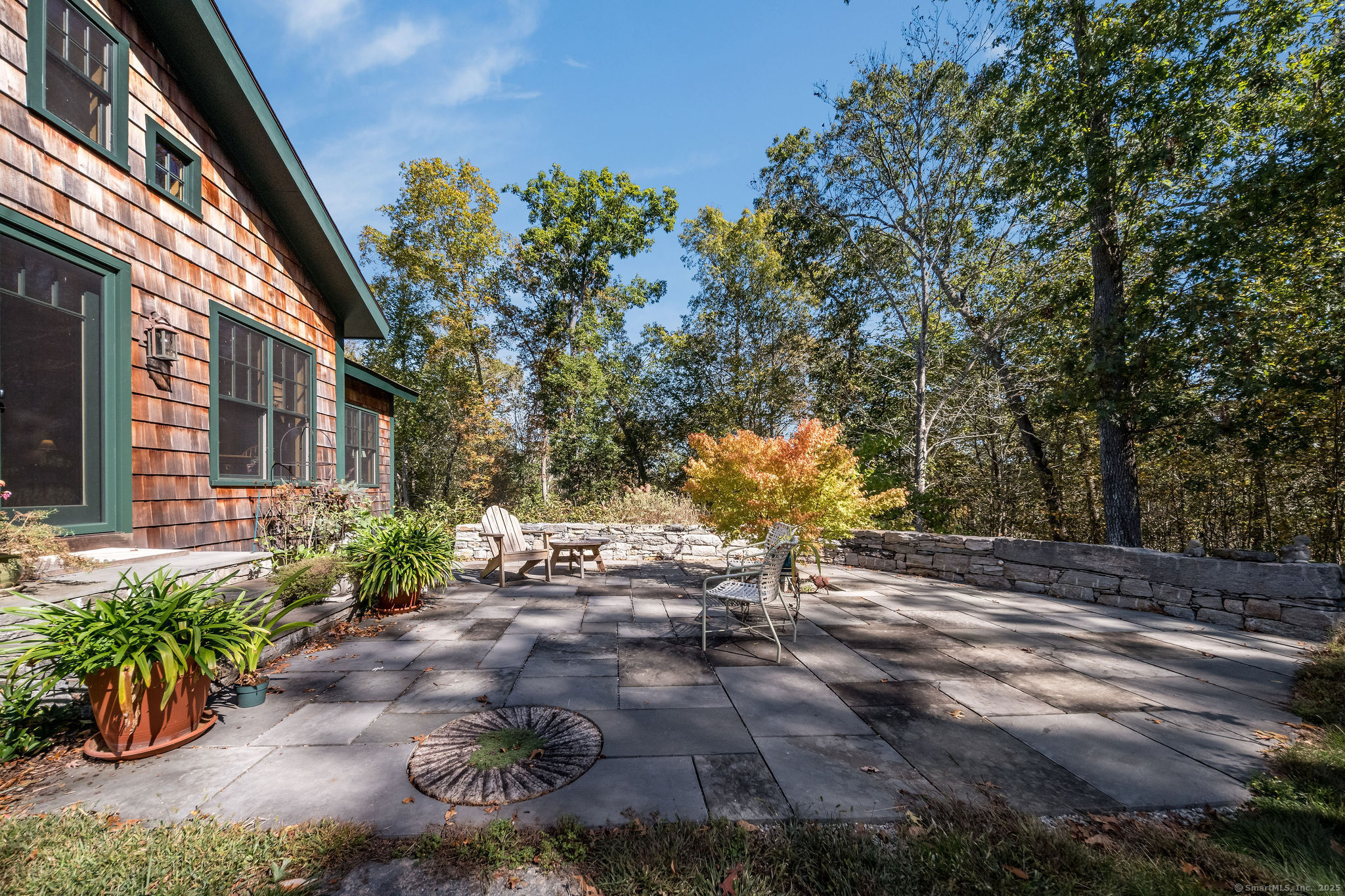 435 Hamburg Road Lyme, CT 06371 - Photo 30 of 40 a backyard of a house with outdoor seating