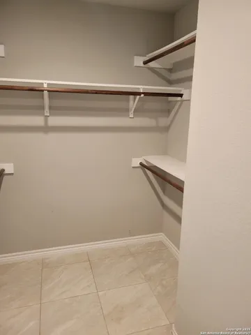 a view of a room with racks on the wall