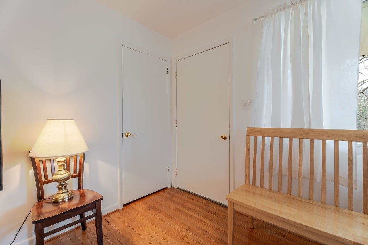 11918 Turleytown Road Broadway, VA 22815 - Photo 3 of 42 a view of a hallway with wooden floor and a bathroom