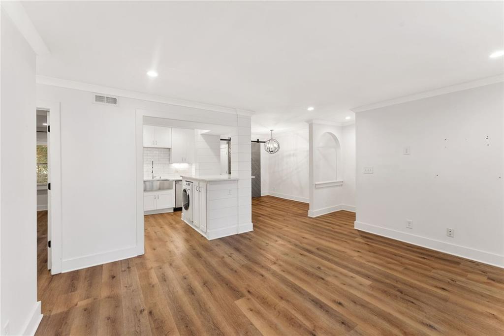 143 Amherst Place Northwest Atlanta, GA 30327 - Photo 6 of 25 a view of kitchen with wooden floor