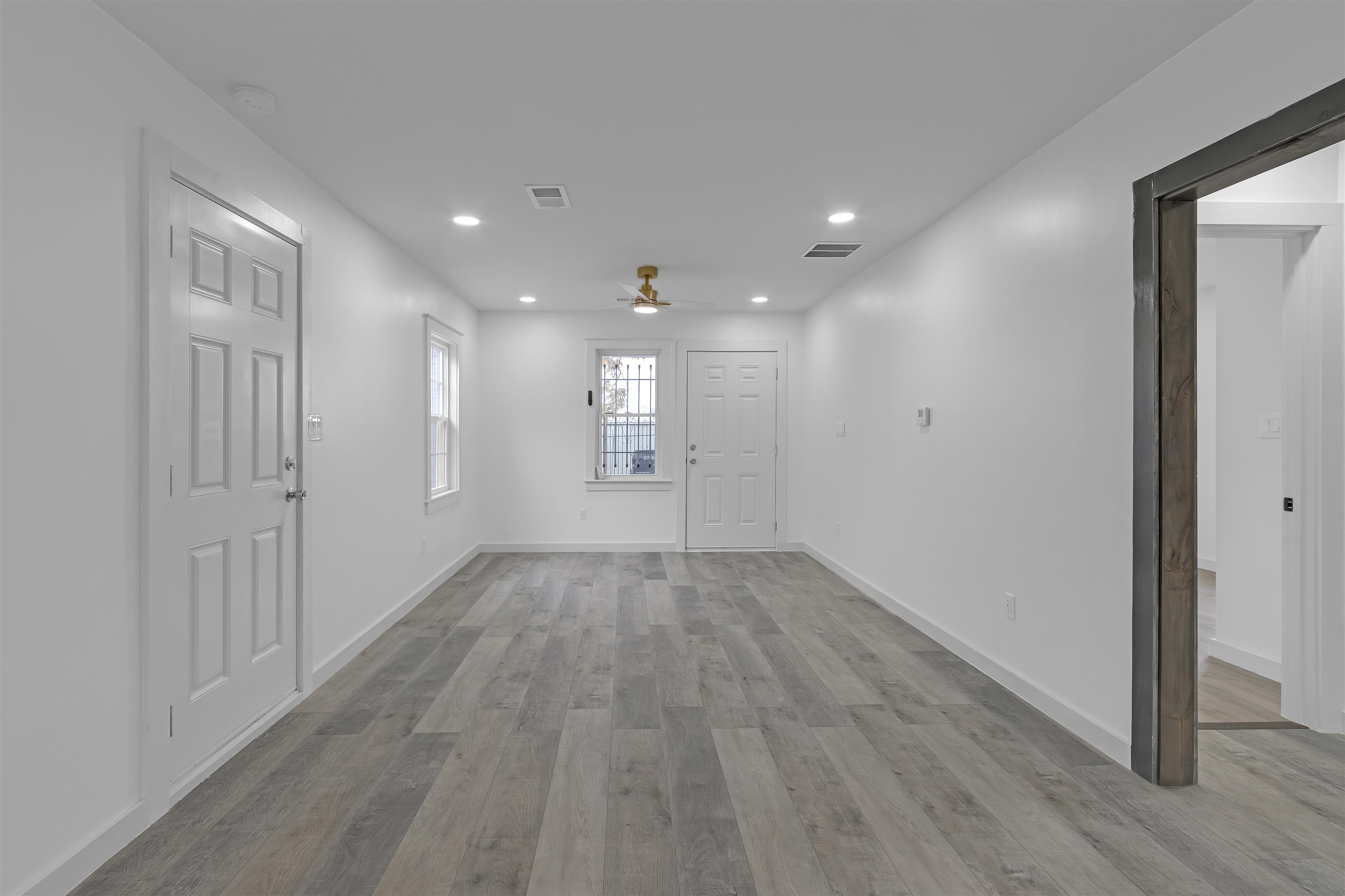 2881 Tutwiler Avenue Memphis, TN 38112 - Photo 13 of 23 Entryway with light wood-style floors, recessed lighting, and a ceiling fan