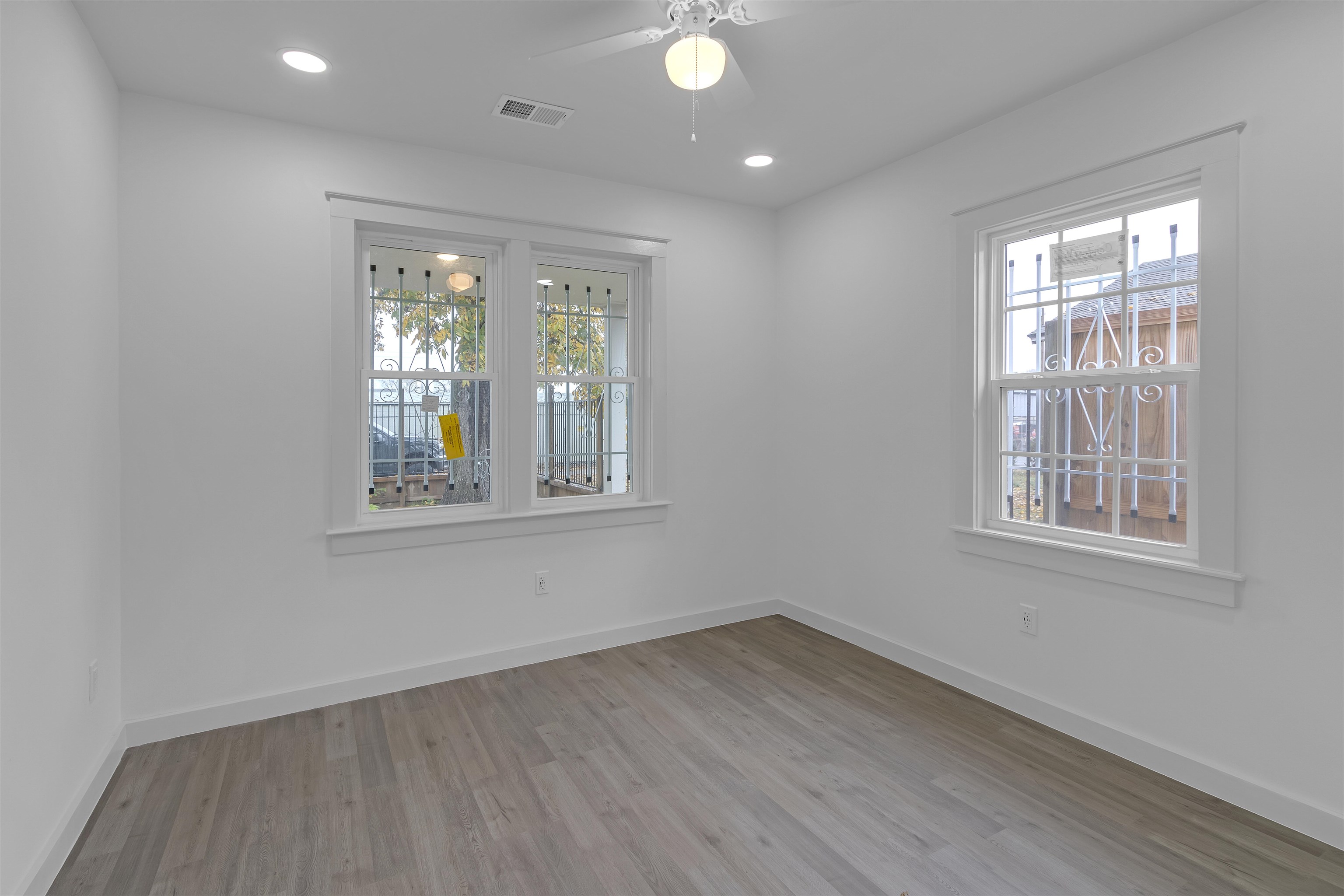 2881 Tutwiler Avenue Memphis, TN 38112 - Photo 14 of 23 Spare room featuring light wood-style flooring, a ceiling fan, and recessed lighting