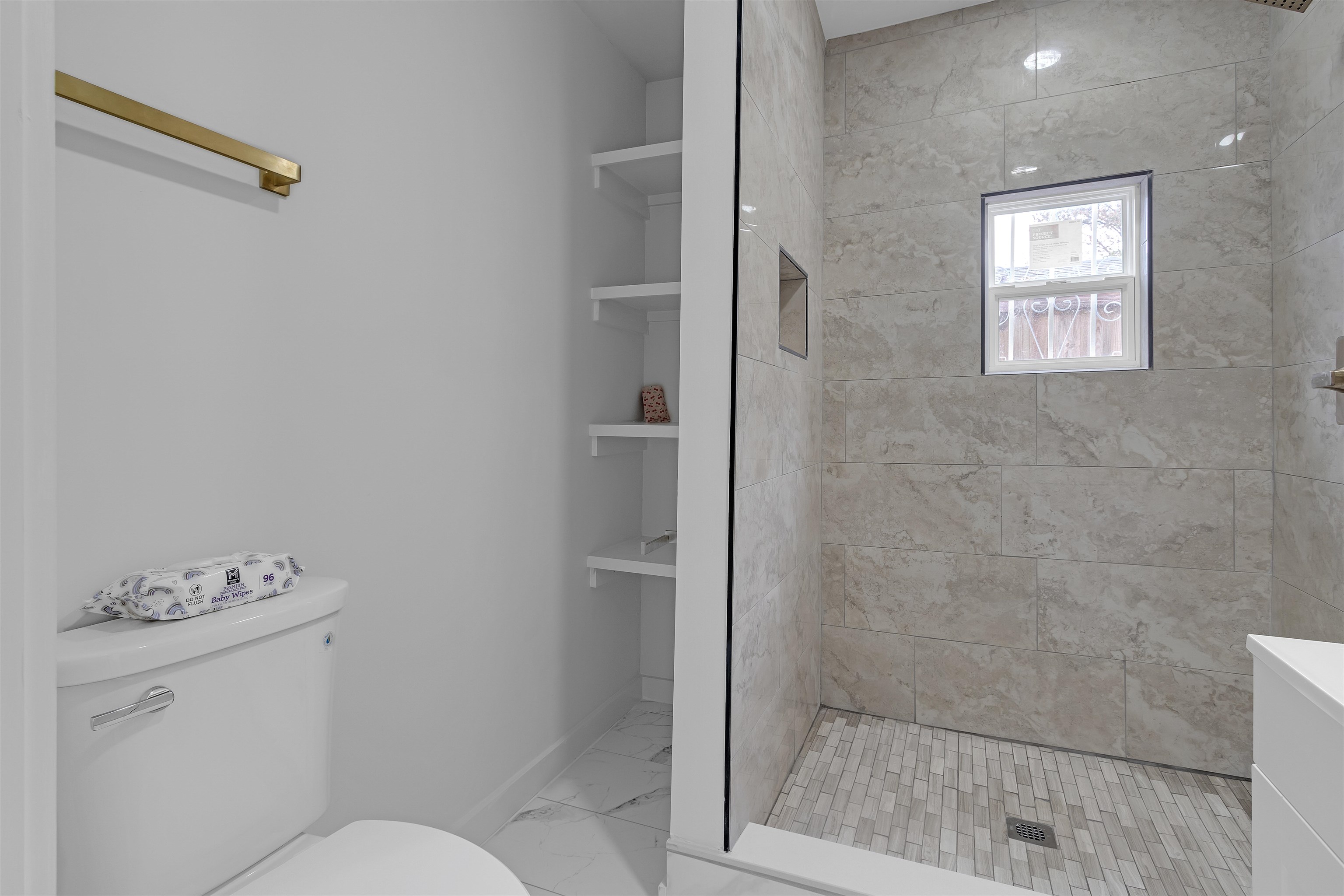 2881 Tutwiler Avenue Memphis, TN 38112 - Photo 17 of 23 Full bath featuring light marble finish floors and a stall shower