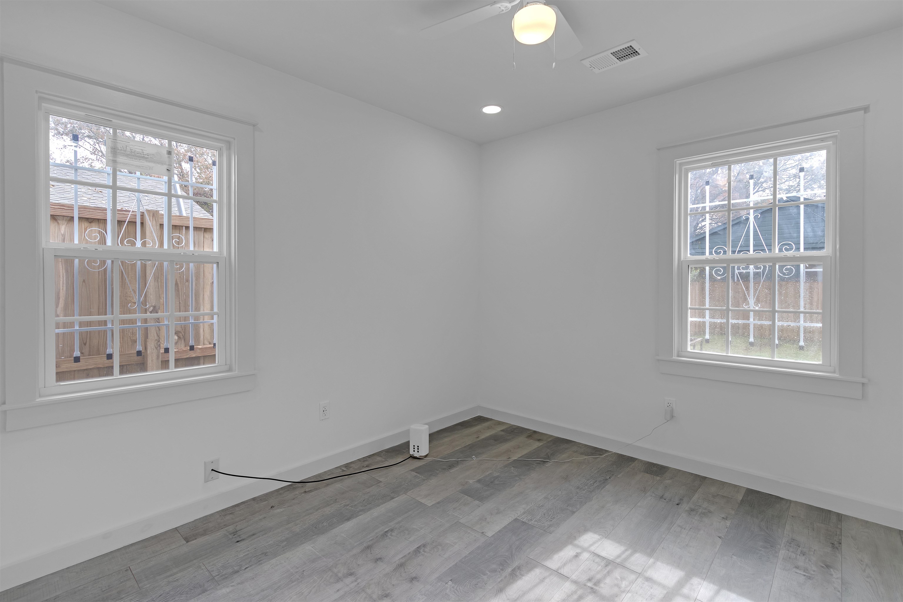 2881 Tutwiler Avenue Memphis, TN 38112 - Photo 18 of 23 Spare room featuring light wood finished floors, recessed lighting, and a ceiling fan