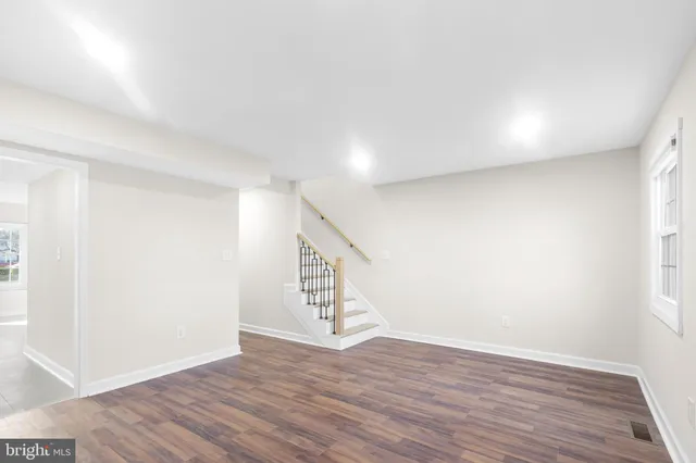 a view of entryway with wooden floor