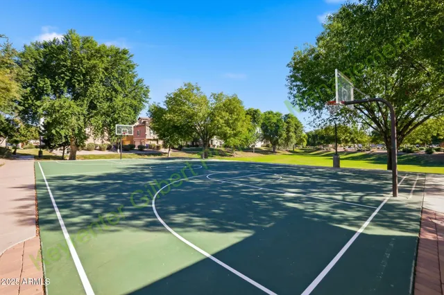 a view of empty room with ceiling fan