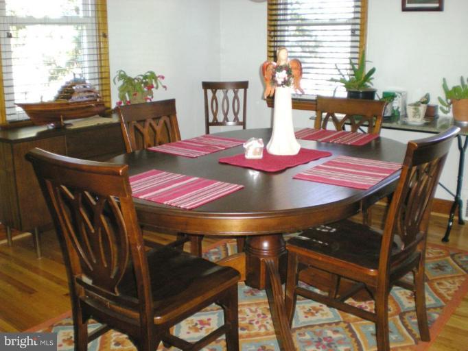 2115 Stonewall Road Catonsville, MD 21228 - Photo 8 of 19 a view of a dining room with furniture and window